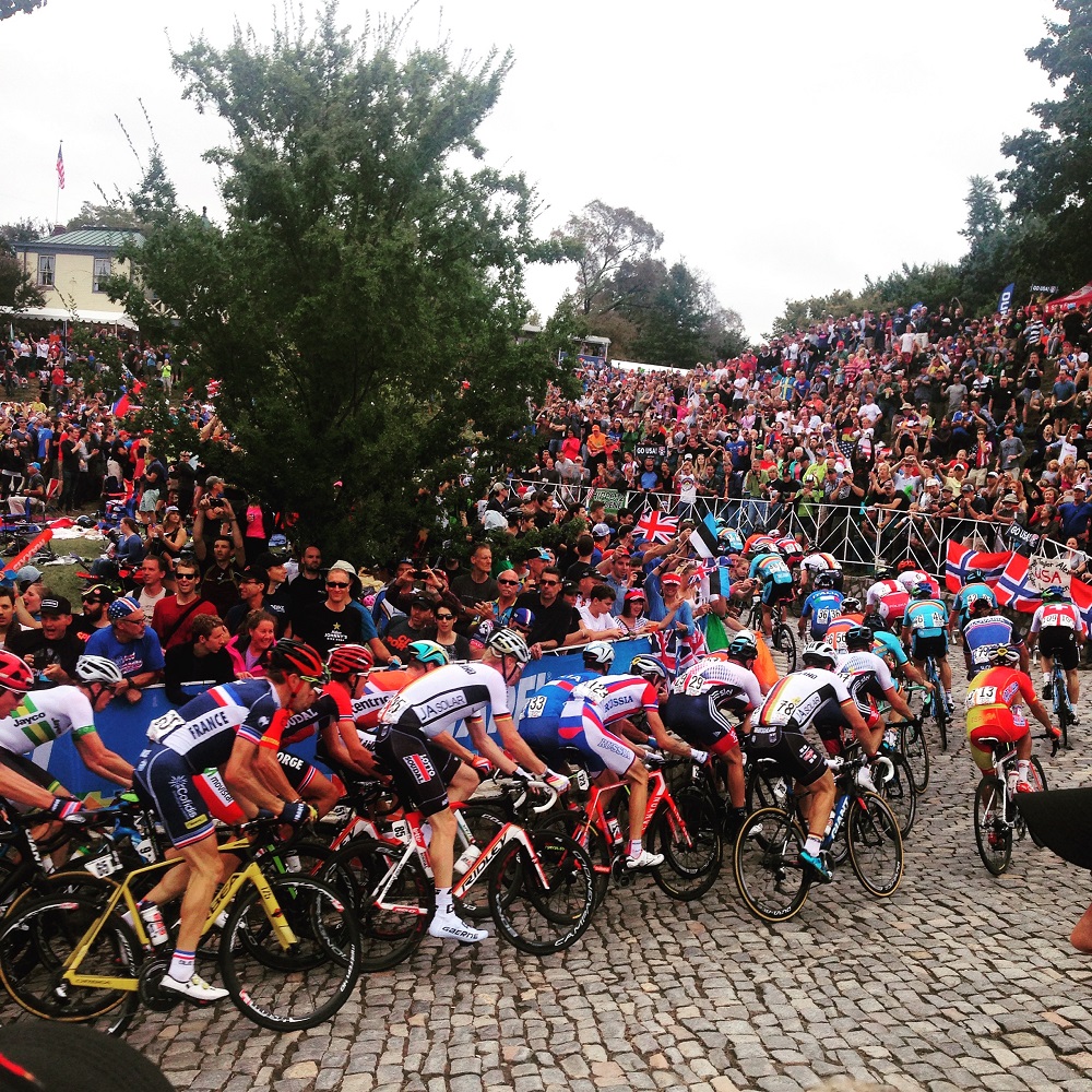 The men's word championship field coming through the crowds and cobbles of Libby Hill